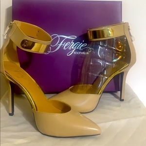 Stiletto heels with metal accents on ankle strap.